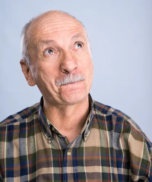 Smiling surprised senior man — Stock Photo, Image