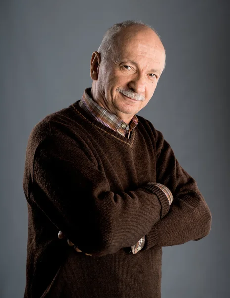 Portrait of a senior smiling man — Stock Photo, Image