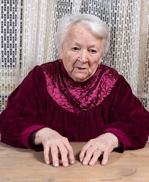 Old sad woman — Stock Photo, Image