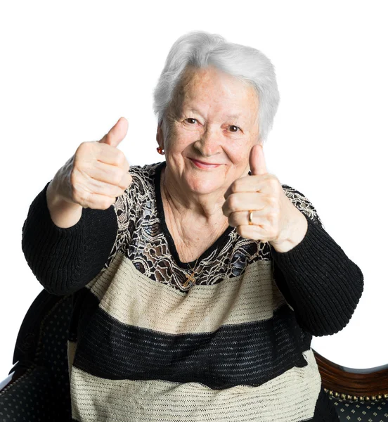 Happy old woman showing ok sign Stock Image