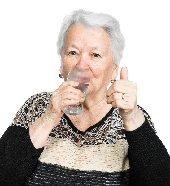 Old woman with glass of water — Stock Photo, Image