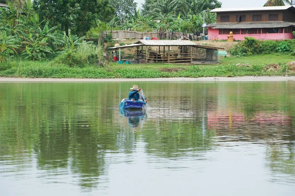 Lonely Man Sits Boat Collects Fish Net Forest Background — Stock Photo, Image