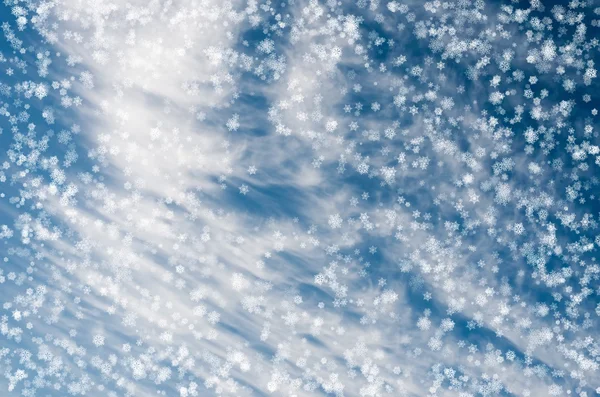 Vallende sneeuwvlokken op blauwe achtergrond — Stockfoto