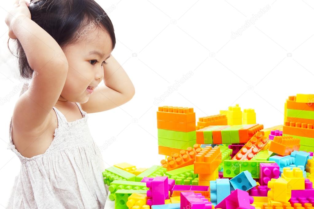 Asian Baby Girl Playing Colorful Blocks Isolated on White Backgr