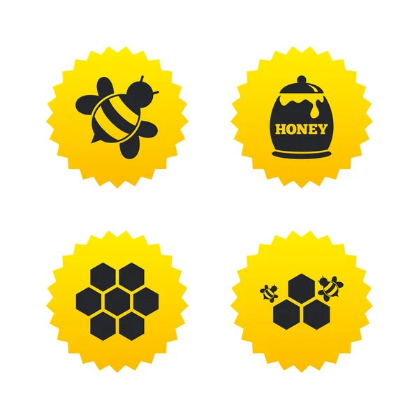 Honey icon. Honeycomb cells with bees symbol. — Stock Vector