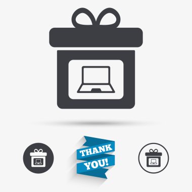 Dizüstü bilgisayar simgeleri içeren hediye kutusu