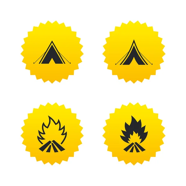 Tourist camping tent and fire icons — Stock Vector