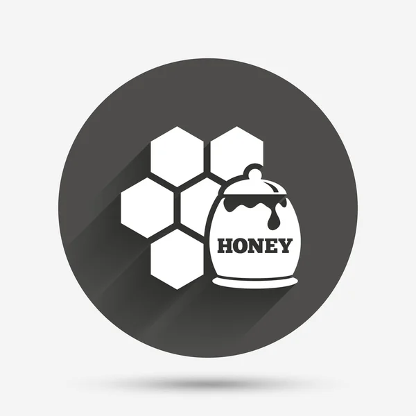 Miel en pot et icône signe nid d'abeille . — Image vectorielle