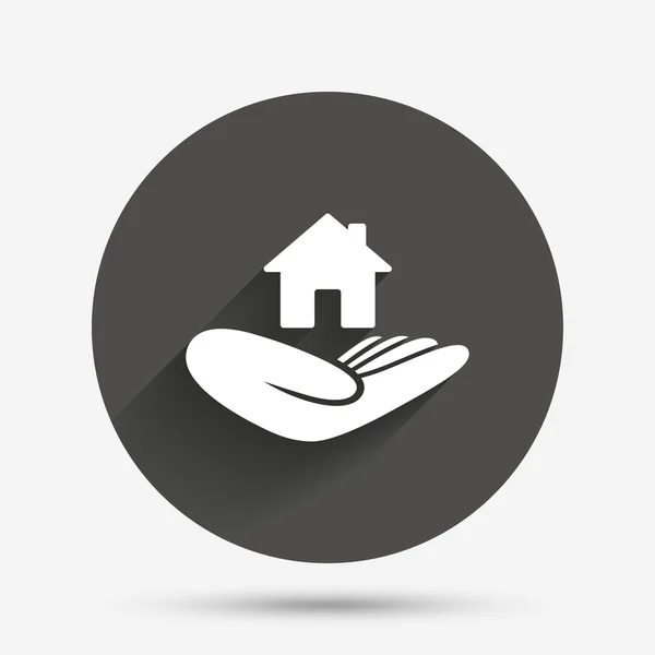 Firma del seguro. La mano sostiene el símbolo del hogar . — Vector de stock