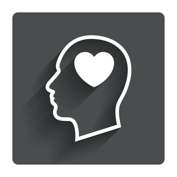 Head with heart icon. — Stock Vector