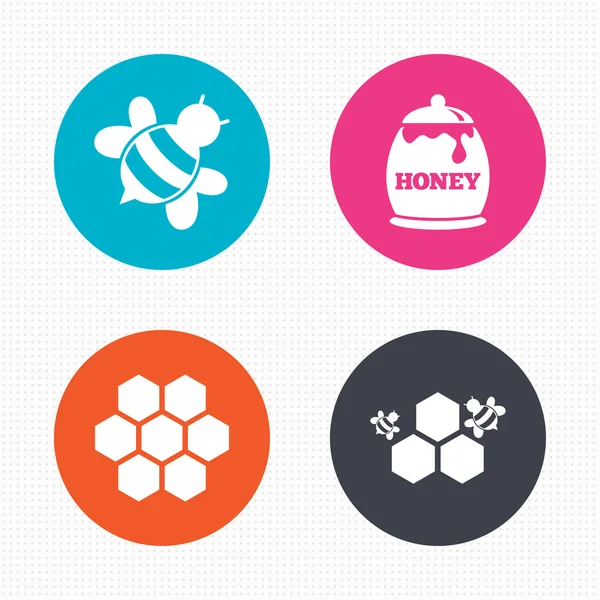 Iconos de miel. Células de panal con abejas — Vector de stock