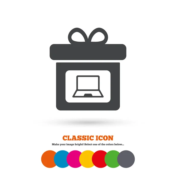 Gift box with laptop icon — Stock Vector