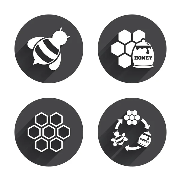 Honey icons. Honeycomb cells — Stock Vector