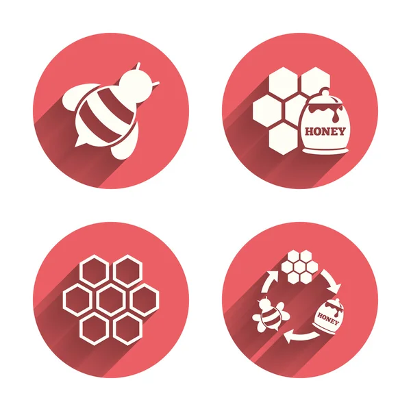 Iconos de miel. Células de panal — Vector de stock
