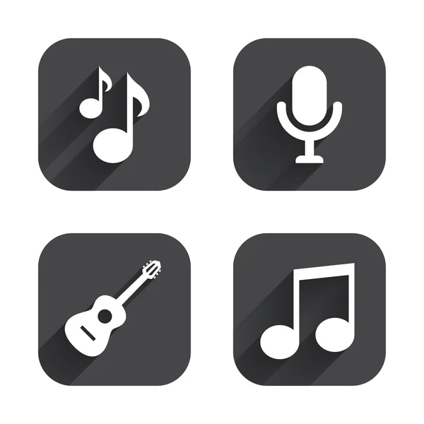 Iconos musicales. Micrófono, Guitarra acústica . — Vector de stock