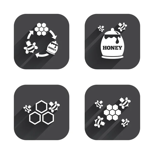 Icono de miel. Células de panal con abejas — Vector de stock