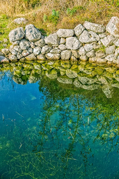 Ancient water trough in the field — Stock Photo, Image