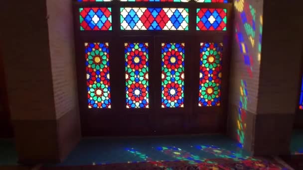 Tourists in the Nasir Al-Mulk Mosque by the windows — Stock Video