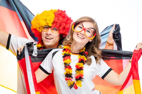 勝利を祝う熱狂的なドイツのスポーツサッカーファンのカップル — ストック写真