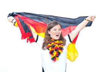 Genç hevesli kadın futbol fanatiği. Alman futbol taraftarı şampiyonluğu kutluyor