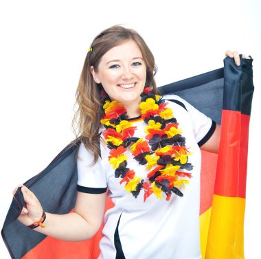 Genç hevesli kadın futbol fanatiği. Alman futbol taraftarı şampiyonluğu kutluyor