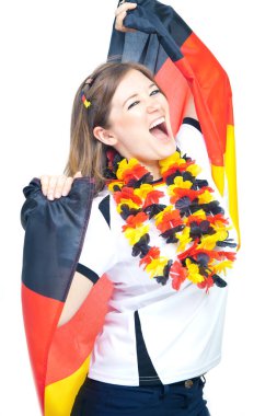 Genç hevesli kadın futbol fanatiği. Alman futbol taraftarı şampiyonluğu kutluyor