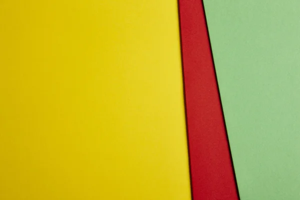 Цветной картонный фон в желтом, красно-зеленом тоне. Copy sp — стоковое фото