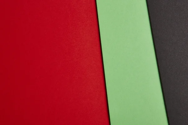 Kartony kolorowe tło w czerwony, zielony, czarny dźwięk. Skopiować sp — Zdjęcie stockowe