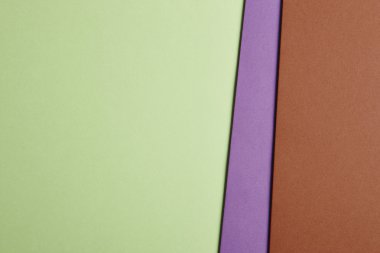 Renkli kartonlar arka planda yeşil, mor, kahverengi sesi. Kopya