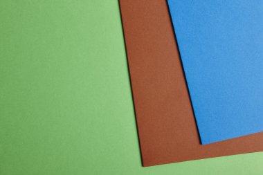 Renkli carboards arka planda yeşil, kahverengi, mavi tonu. SP kopyalama