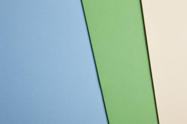 Renkli kartonlar arka planda mavi, yeşil, bej sesi. Kopya s