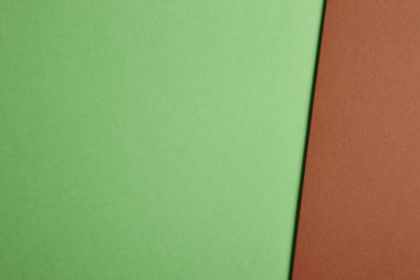 Renkli carboards arka planda yeşil ve kahverengi sesi. Kopya alanı