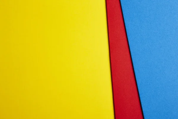 Carboards kolorowe tło tonem żółty, czerwony, niebieski. Kopia spa — Zdjęcie stockowe