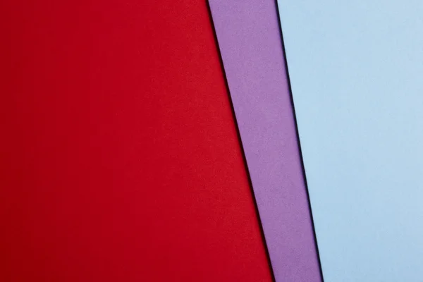 Цветной картонный фон в красный фиолетовый синий тон. Спак для копирования — стоковое фото