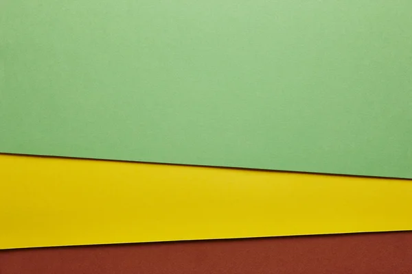 Kartony kolorowe tło zielony żółty brązowy tonem. Skopiować s — Zdjęcie stockowe