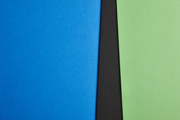 彩色的硬纸板背景在蓝色黑色绿色色调。水疗中心副本 — 图库照片