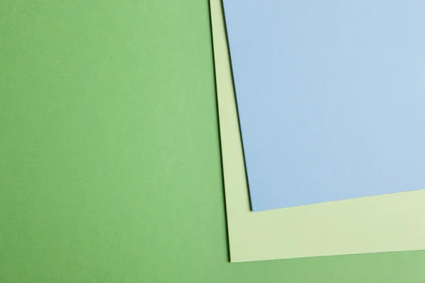 彩色的硬纸板背景在绿色的蓝色色调。复制空间 — 图库照片