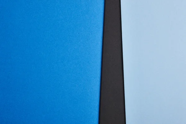 Colored cardboards background in blue and black tone. Copy space — Stock Photo, Image