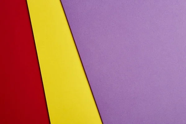 Цветной картонный фон в фиолетовом желтом красном тоне. Copy sp — стоковое фото