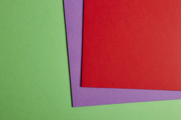 彩色的硬纸板背景在绿色紫色红色调。水疗中心副本 — 图库照片