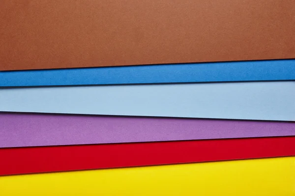 Fundo de papelão colorido em muitas cores. Espaço de cópia — Fotografia de Stock