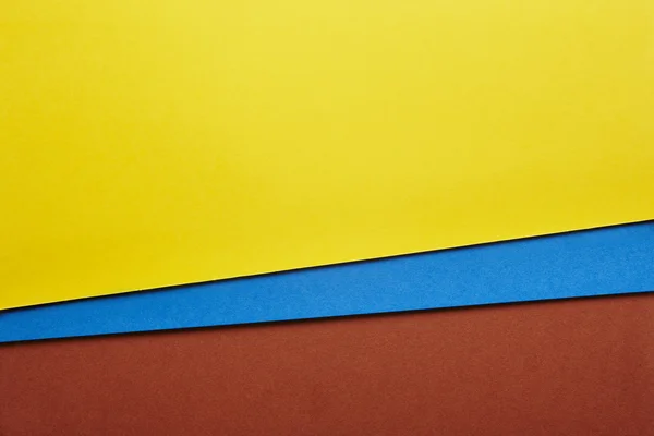 Fondo de cartón de color en tono amarillo azul marrón. Copiar sp —  Fotos de Stock