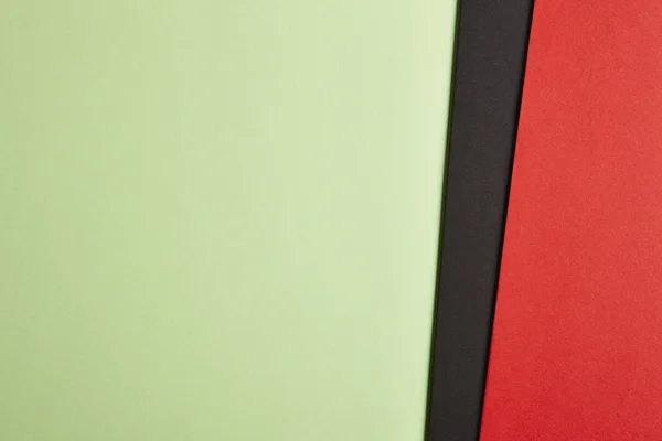 Kartony kolorowe tło zielony czarny czerwony dźwięk. Skopiować spac — Zdjęcie stockowe