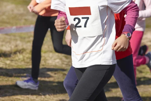 Junior athletic runners on a cross country race. Outdoor circuit — Stock Photo, Image