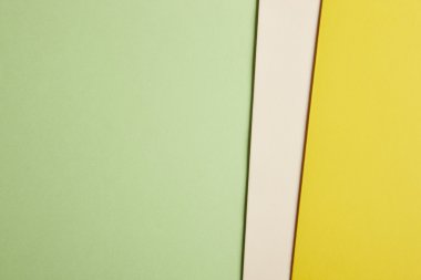 Renkli kartonlar arka planda yeşil bej sarı sesi. Kopya s