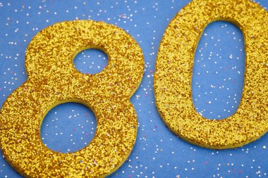 Seksen sarı renk mavi bir arka plan üzerinde numara. Yıldönümü