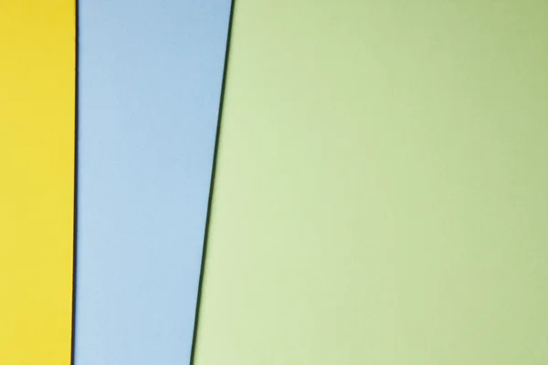 Цветной картонный фон в желтом синем зеленом тоне. Copy sp — стоковое фото