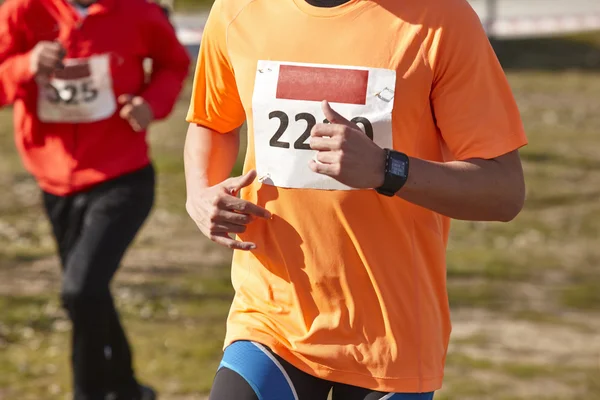 Male athletic runner on a cross country race. Outdoor circuit — Stock Photo, Image