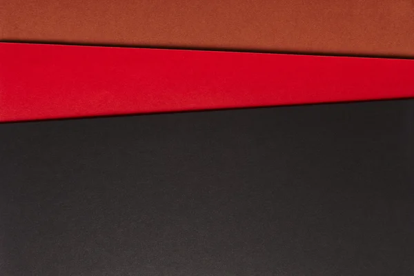 Barevné kartony pozadí černé červené hnědý tón. Kopírovat spac — Stock fotografie