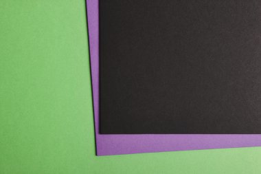 Renkli kartonlar arka planda yeşil mor siyah sesi. Kopya s